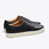 Pair of black leather Diego Everyday Sneakers with white rubber soles and tan lining on a white background.