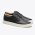 Pair of black leather Diego Everyday Sneakers with white rubber soles and black laces on a white background.