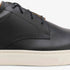 Close-up of a black leather Diego Everyday Sneaker with matching laces and a thick white rubber sole.