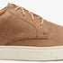 Close-up of a brown leather Diego Everyday Sneaker with tan laces and a thick white rubber sole.