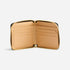 Open black leather zip wallet with a tan interior, four card slots, and a gold-tone metal zipper.