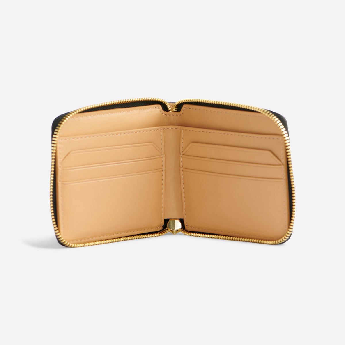 Open black leather zip wallet with a tan interior, four card slots, and a gold-tone metal zipper.