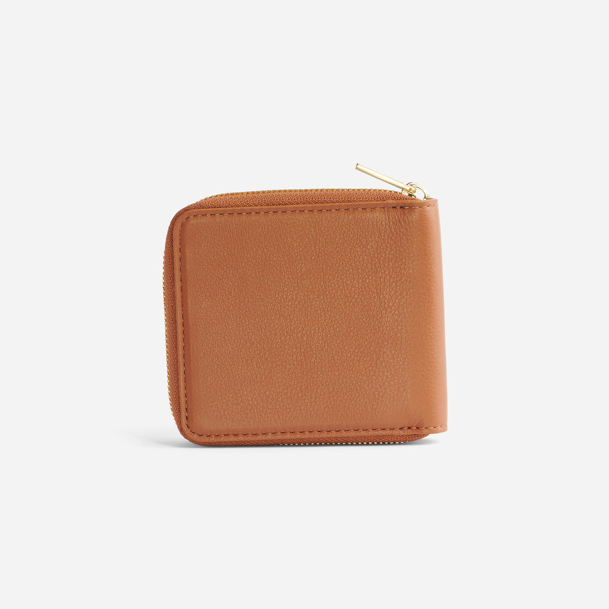 Square caramel leather Remi Zip Wallet with a gold-tone metal zipper on a white background.