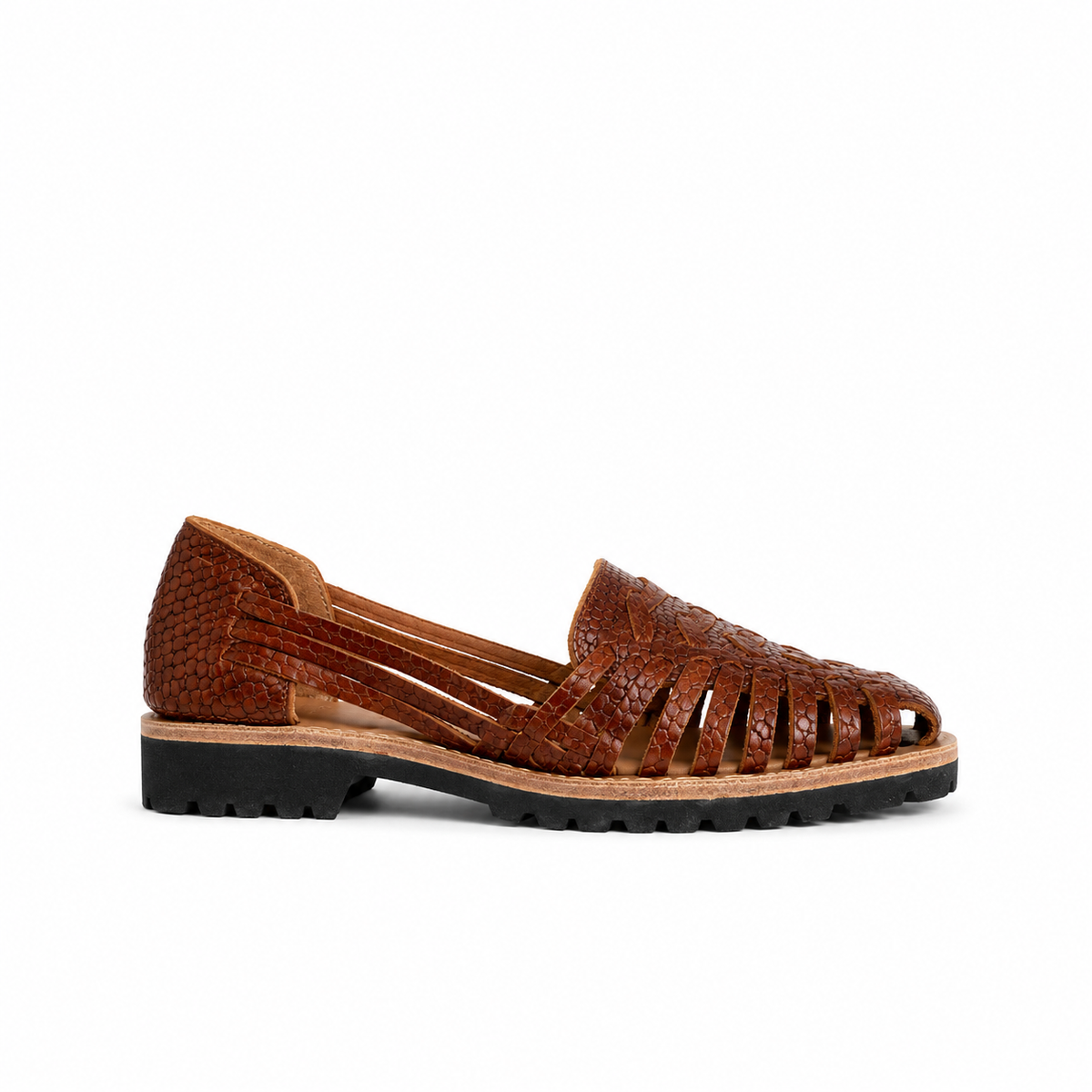 Single brown woven leather Huarache sandal with a snake-print texture and a thick black lug sole.
