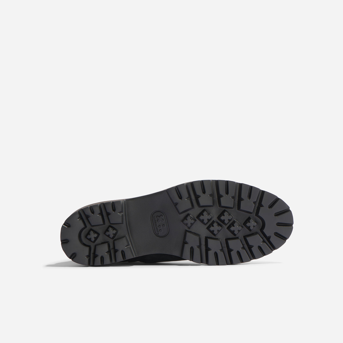 Black rubber lug sole of a Men's Go-To Chelsea Boot 2.0 with EXTRALIGHT logo printed in the center.