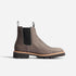 Single grey fabric Chelsea boot with black elastic side panels, pull tabs, and a thick lugged rubber sole.