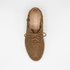 Single brown woven leather boot with laces, top view on white background. NISOLO brand logo printed on the inner heel.