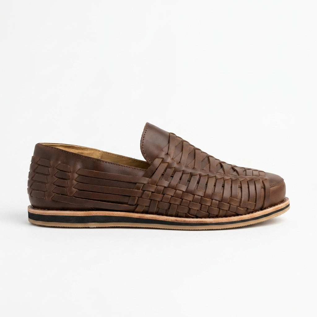 Single brown woven leather Huarache slip-on shoe shown from a side profile against a white background.