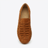 Single terracotta suede woven slip-on shoe with NISOLO printed on the tan interior heel.