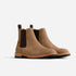 Pair of tobacco brown leather Chelsea boots with dark elastic side panels and pull tabs on a white background.