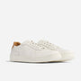 Pair of white leather Beto Go-To Court Sneakers with tan heel accents and white laces on a white background.