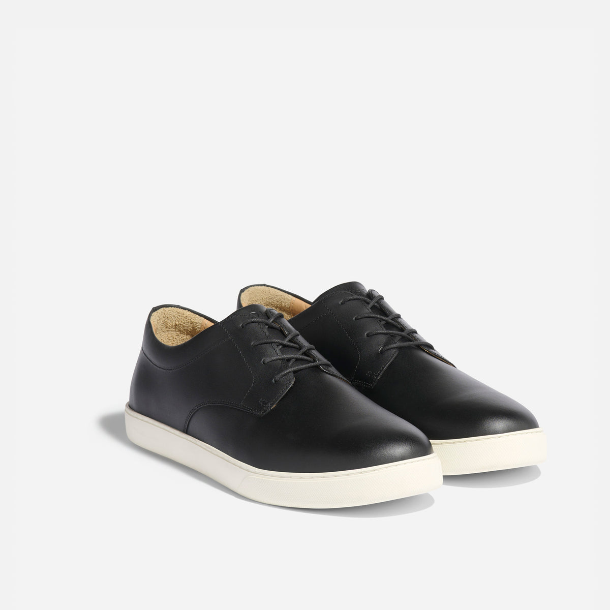 Pair of black leather Diego Everyday Sneakers with white soles and black laces on a white background.
