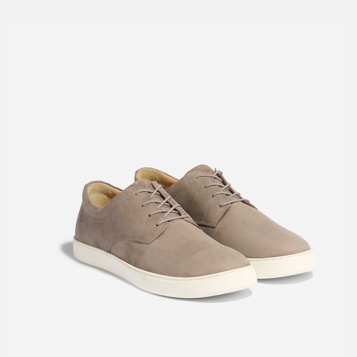 Pair of grey leather Diego Everyday Sneakers with matching laces and white rubber soles on a white background.