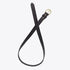 Black leather Noemi Belt 2.0 with a gold-tone metal D-ring buckle and two brass rivets.