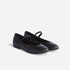 Pair of black leather Bea Go-To Mary Jane flats with round toes and elastic straps on a white background.