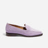 Single lilac suede loafer with whipstitch detailing and a dark brown sole shown from a side profile.