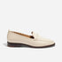 Single pearl leather loafer with whipstitch detailing and a dark brown sole shown in profile against a white background.