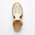 Single bone white woven leather Huarache T-Strap Espadrille Sandal with a jute sole and NISOLO printed on the heel.