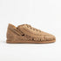 Single tan woven leather bootie with laces and a flat sole shown from a side profile against a white background.