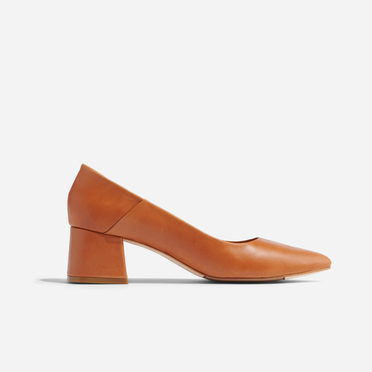 Single caramel leather Fiorela Go-To Mid Heel pump with a pointed toe and block heel shown from a side profile.